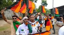 Bangladesh farmer unfurls vast Germany banner to show World Cup support