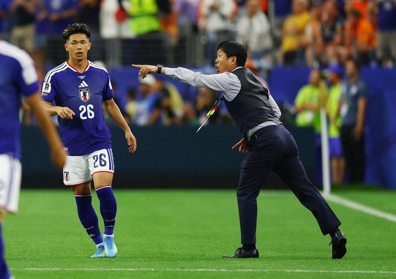 Soccer-Japan coach lauds fightback but draw with Dutch 'disappointing'
