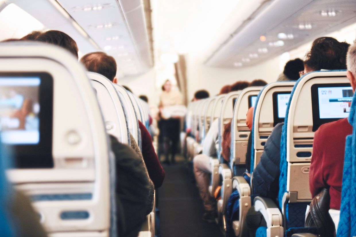 As global oil prices rise, airlines are forced to turn to cost-saving measures, including scaling down routes and services. — Unsplash