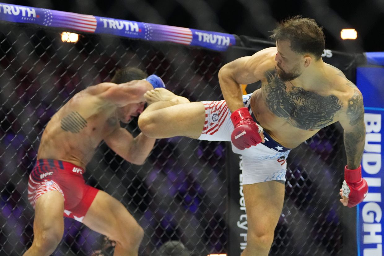 Mauricio Ruffy (right) fights Michael Chandler during their lightweight bout at UFC Freedom 250. Photo: AP