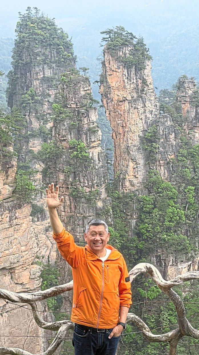 The writer is never bored of visiting beautiful natural wonders like Zhangjiajie.
