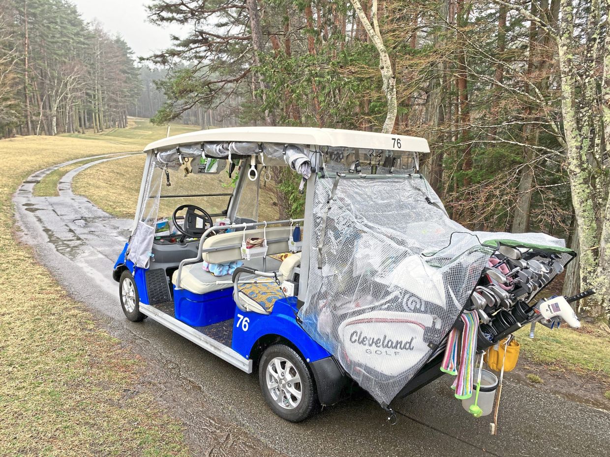 This driverless golf cart is remotely controlled by a caddy. — ROSALIND MCKENZIE/dpa