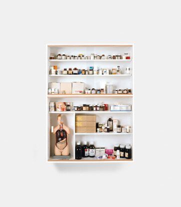 Made while Hirst was a student at Goldsmiths, ‘Sinner’ (1988) – the first work in his 'Medicine Cabinets' series – consists of a cabinet filled with empty pill bottles and pharmaceutical packaging left behind by his late grandmother. Her medicine cabinet was always stocked with medicines supplied by the National Health Service (NHS), which he felt resembled a kind of altar reflecting absolute faith.