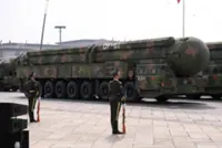 China says growing its military helps world peace