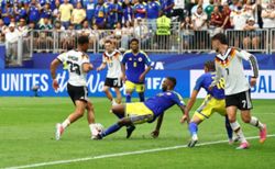 Soccer-Germany cruise to 7-1 win over debutants Curacao in Houston