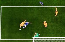 Soccer-Japan battle back to draw 2-2 with Netherlands in Texas thriller