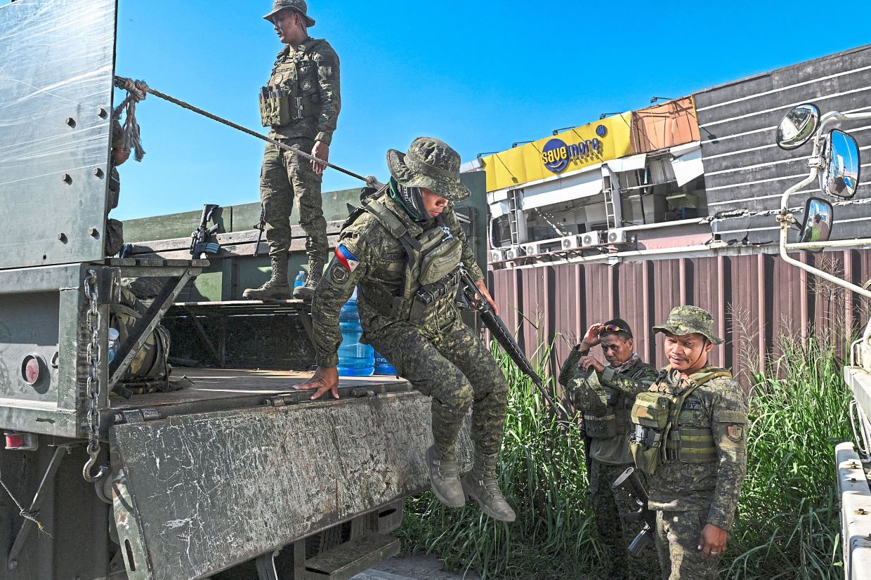Soldiers arriving to bolster search-and-rescue efforts as communities grapple with the aftermath of the devastating tremor. — Reuters