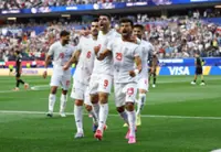 Soccer-Iran fight back to draw 2-2 with New Zealand at World Cup