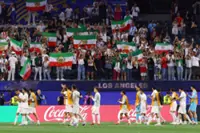 Soccer-Boos, cheers and a draw: Iran's World Cup opener reflects deep divisions