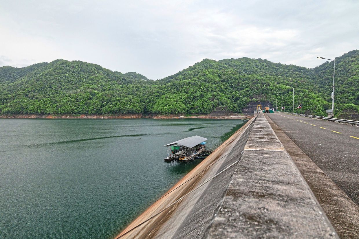 The Vajiralongkorn Dam as seen in Thong Pha Phum, Thailand. — AP