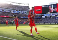 Soccer-Haaland announces arrival with World Cup double as Norway crush Iraq