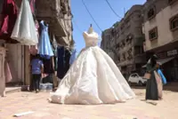 How one Gaza dressmaker finds style, sustainability and hope amid ruins