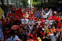 South African labour unions urge workers to shun anti-migrant protests