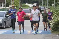 DAK solidarity runner twists knee, determined to press on to finish 290km Taiping–Parliament mission