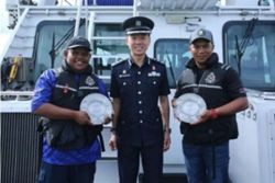 Two Malaysian men who helped Singapore police recover stolen boat get public spiritedness award