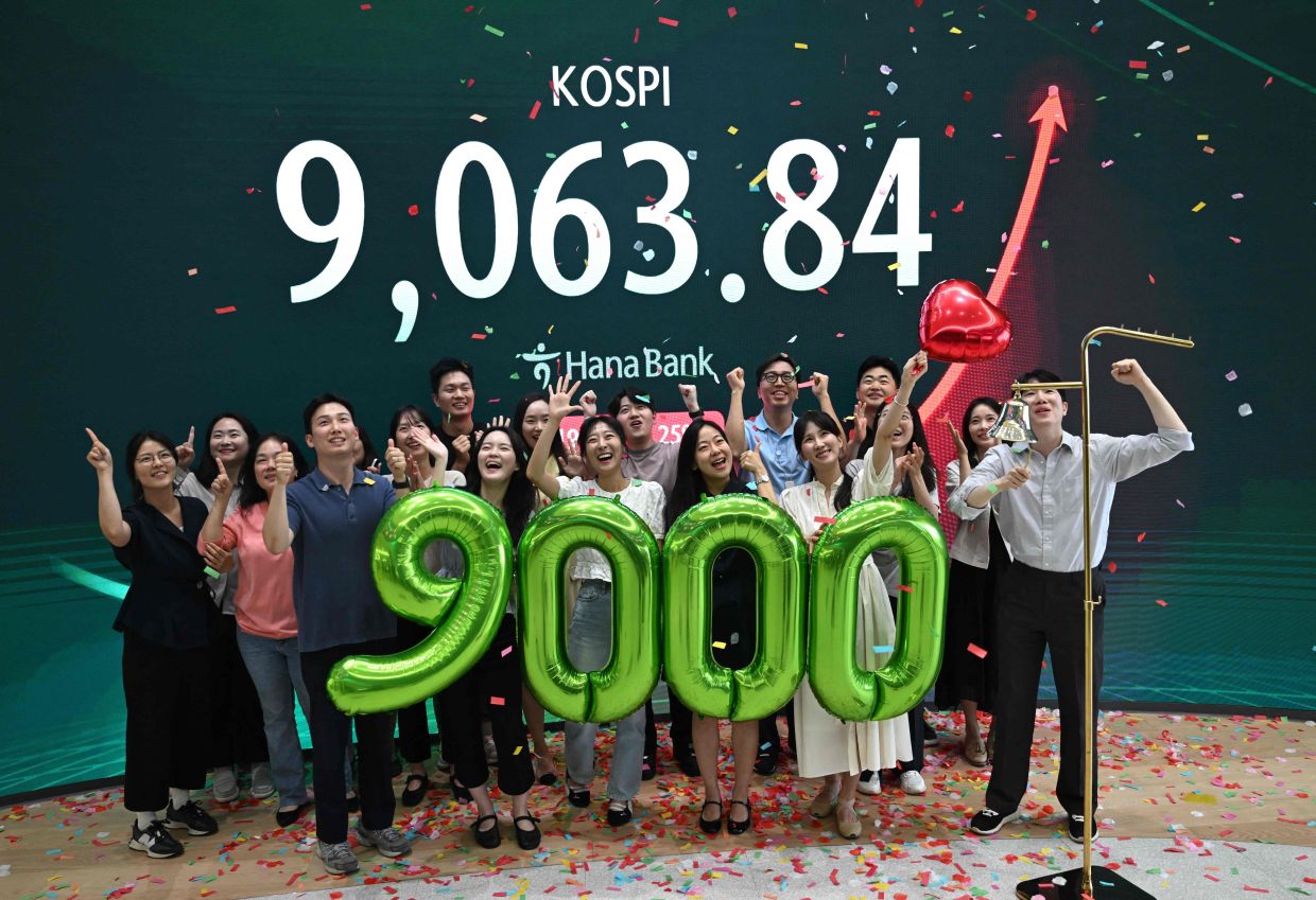 South Korea's KOSPI index tops 9,000 as chipmakers hit records