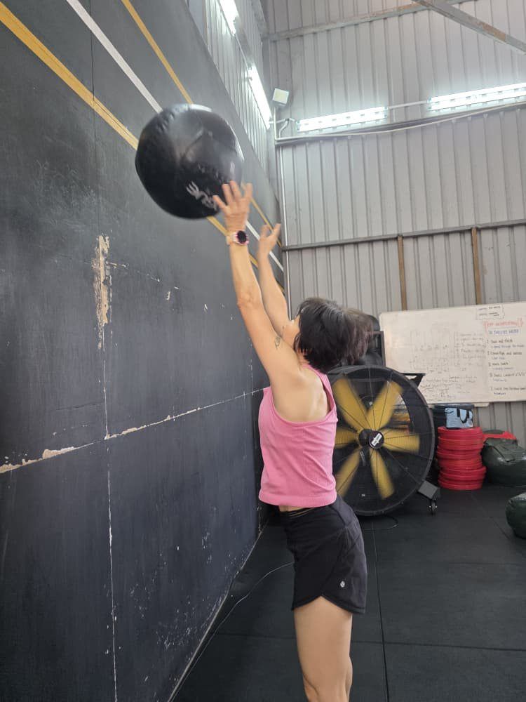 Jing Ching training on the Wall Balls, often regarded as the toughest station in the Hyrox race.