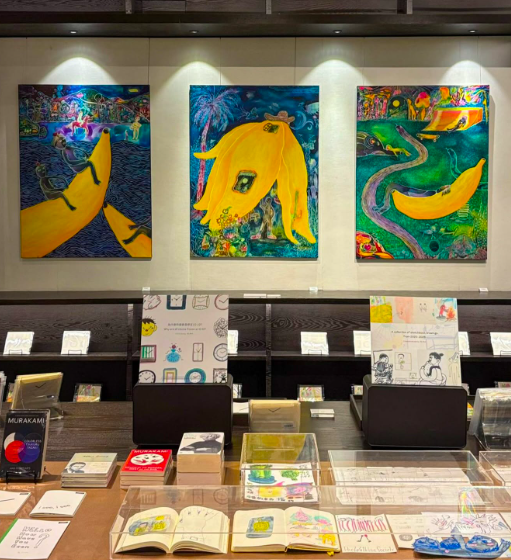 At Kua's 'Going Bananas' mini exhibition at Tsutaya Books Pavilion Bukit Jalil, visitors can view her large-scale banana paintings alongside a curated selection of art zines and books that have shaped her practice. Photo: The Back Room