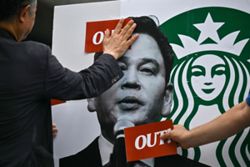 S. Korean police quiz executive in Starbucks 'Tank Day' fiasco