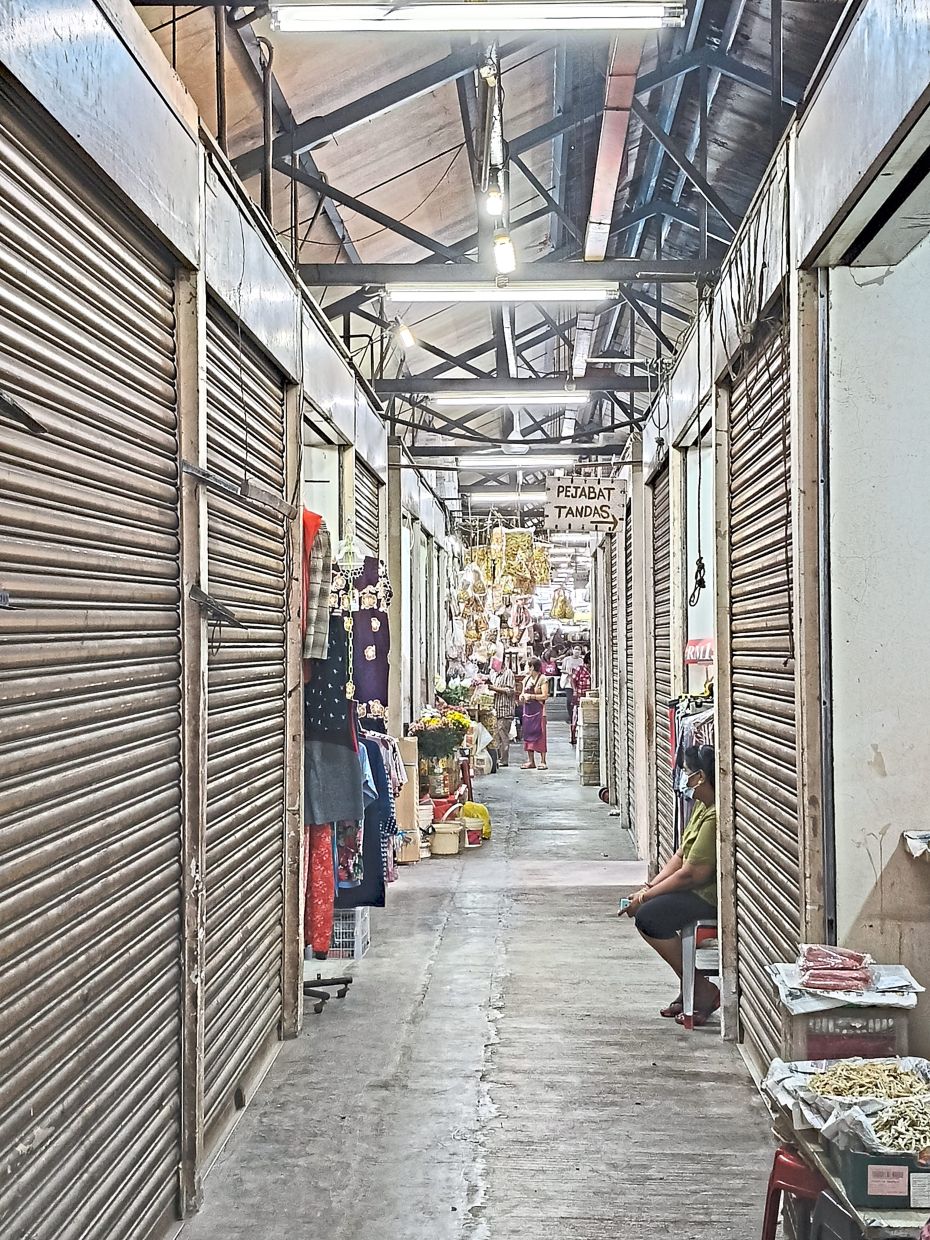 Traders say business has plummeted since they moved to the temporary site in 2018.