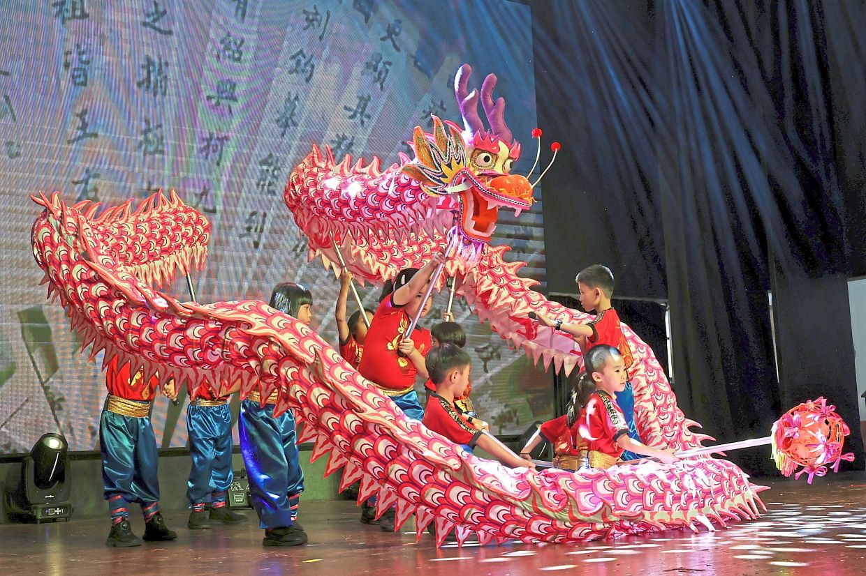 Dragon dance performance by a children’s troupe at Penang Chinese Town Hall.
