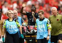 Soccer-Kone's broken leg casts shadow over Canada's historic World Cup win