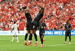 Soccer-David hat-trick as Canada crush nine-man Qatar 6-0 to earn first World Cup finals win