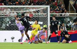 Soccer-Romo's goal sends Mexico through but blunt attack leaves questions