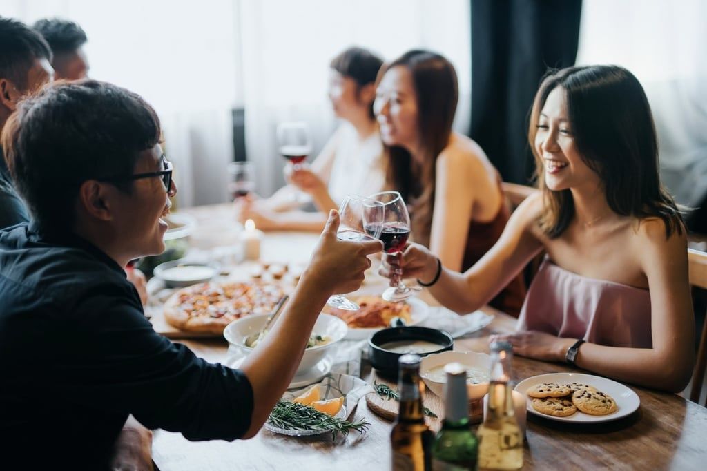 A Chinese couple toasts each other over a blind-date meal. -- Photo: Getty Images via SCMP