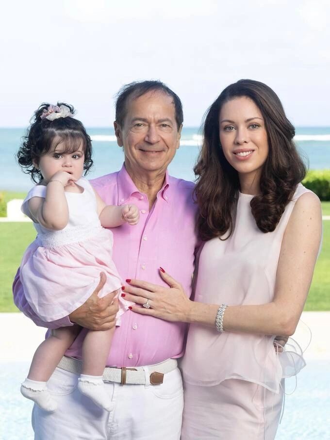 Billionaire John Paulson with his fiancée, Alina de Almeida, and their eldest daughter, now 16 months old. -- Photo from Instagram