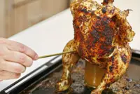 Chicken on barbecue throne