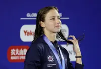 Swimming-American Douglass breaks 50m freestyle world record