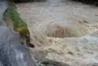 Water surge sweeps away bridge in Gopeng, 69 evacuated