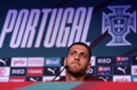 Soccer-Dalot hits back at Portugal critics, defends Ronaldo