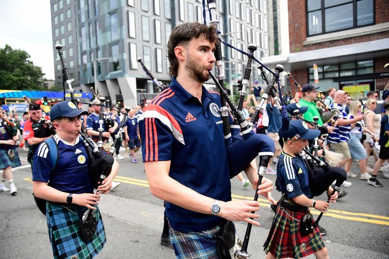 Soccer-Bye Bye Boston: Scotland's Tartan Army bids farewell to sleepless city