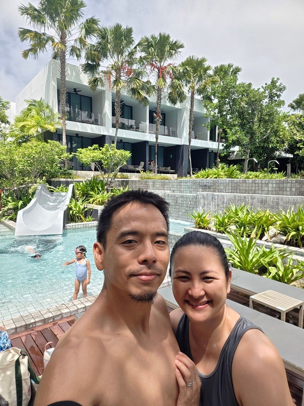 Canlas and his wife, Margarette, relax by the pool on a staycation in May, after he had lost 27kg. - Photo: Ayo Canlas