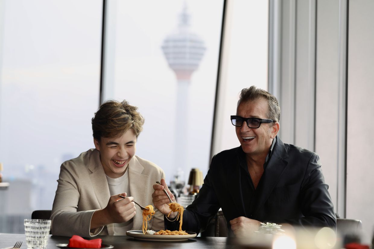 Max (left) and Modesto (right) share a close bond, bolstered by their shared love of good food.— LOW LAY PHON/The Star