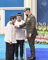King confers medals on 124 recipients
