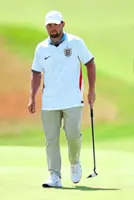 Putt in the wind with steady base, true roll