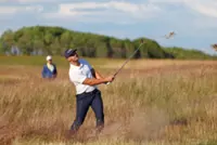 Golf-Clark eyes second US Open crown with massive lead
