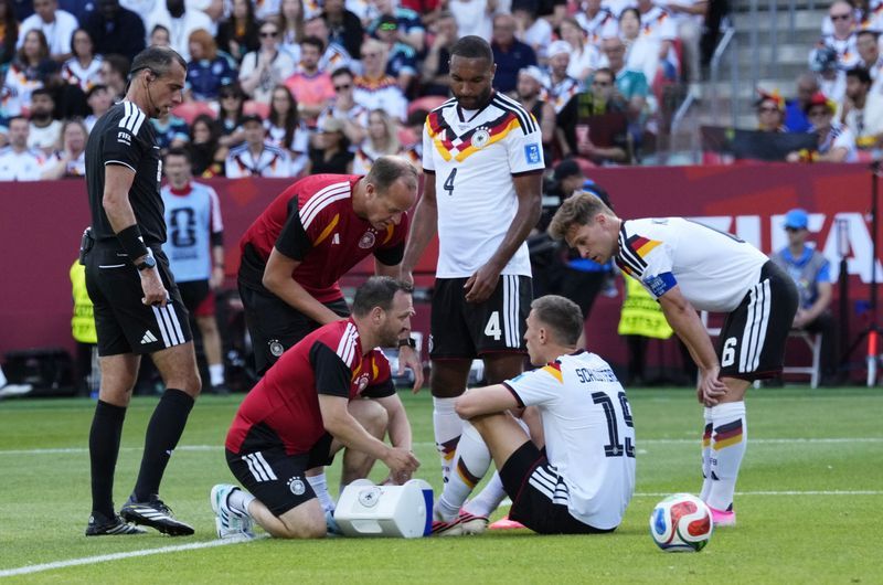 Soccer-Germany defender Schlotterbeck out of World Cup with ankle injury
