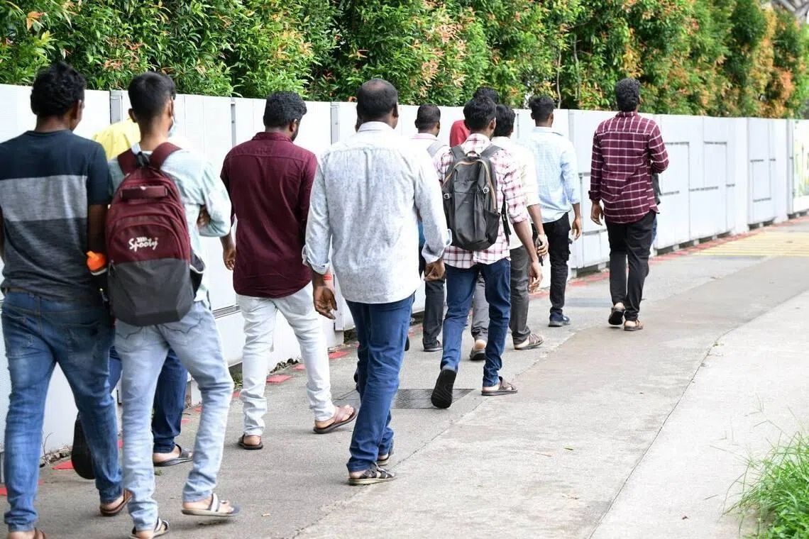 The workers said they have not been paid for at least two months and have been unable to contact the recruiting agent. -- ST PHOTO: NG SOR LUAN