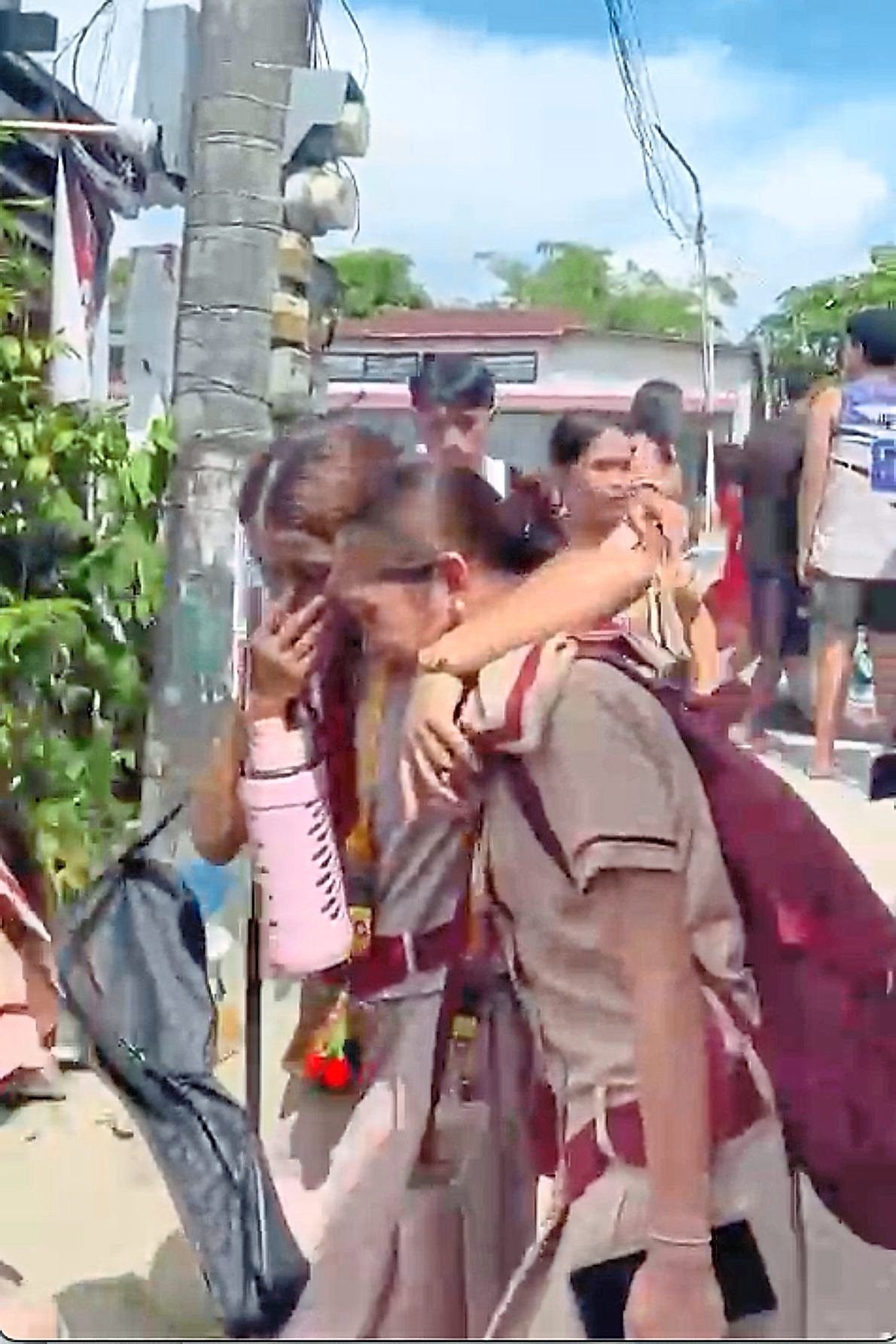 Shattered safety : A screencap of students reacting after the incident at the school. — AP