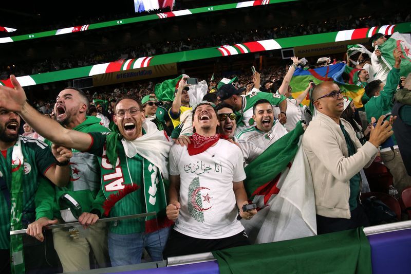 Soccer-Algeria's win lifts Kansas town that adopted their World Cup dream