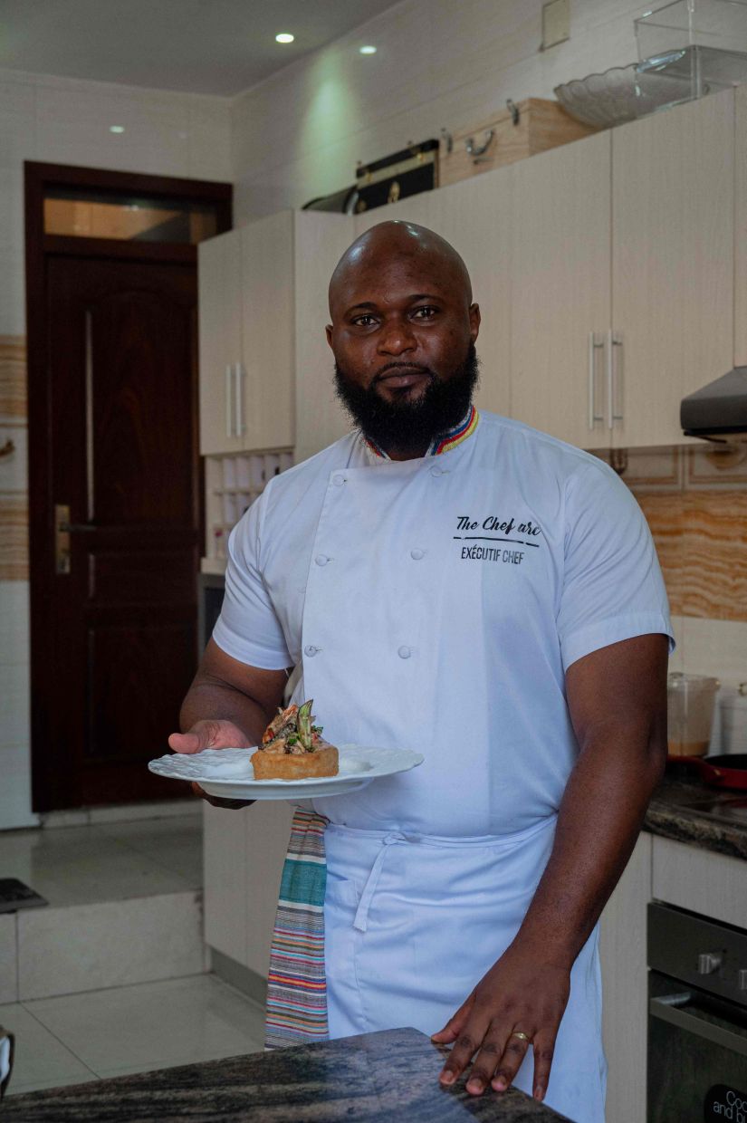 Congolese chef Archi Dimosi presents one of his dishes in Kinshasa.