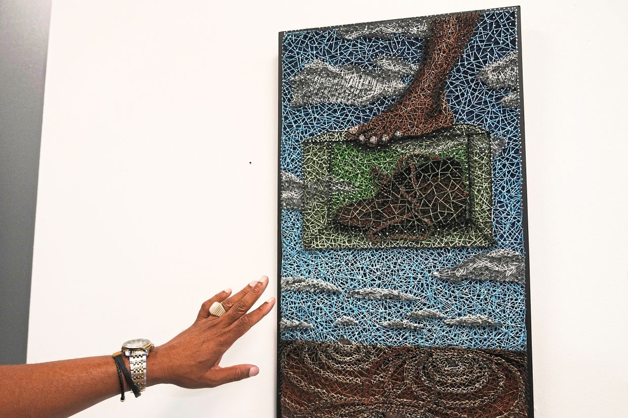 An artwork titled 'Can’t Walk In Your Shoes' by artist Ndako Nghipandulwa. Photo: AP