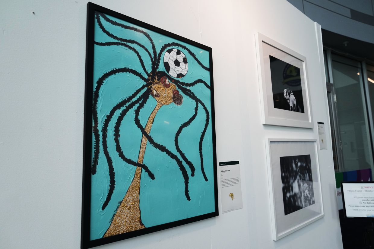 A painting titled 'A Beautiful Game' by artist Durrett, who is passionate about highlighting under-represented communities. Photo: AP