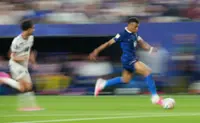 Soccer-Mbappe double sends France into knockout rounds after lengthy weather delay