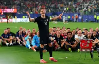 Soccer-Ecstatic Norway squad celebrate World Cup progress with Viking row