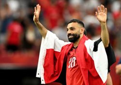 Soccer-Sublime Salah sparks wild celebrations after historic Egypt win